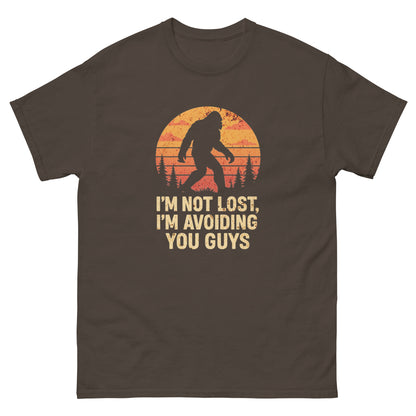 Dark chocolate sarcastic cryptid t-shirt with retro bigfoot sunset artwork