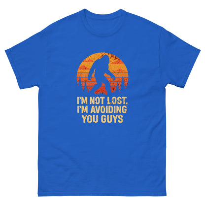 Royal blue bigfoot forest shirt with bold “I’m avoiding you guys” slogan and nature graphic