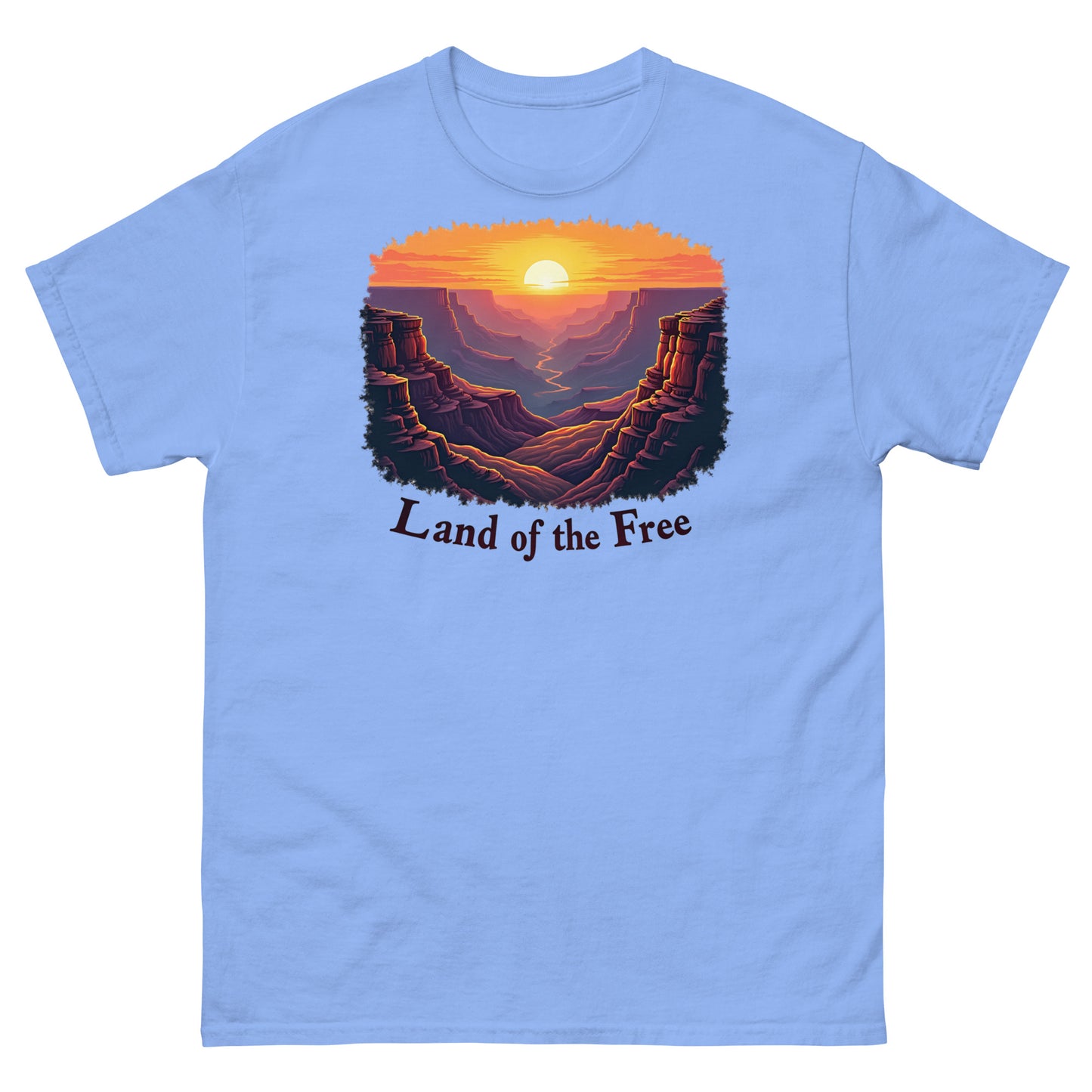 Carolina blue t-shirt featuring a scenic canyon sunrise design with “Land of the Free” text.