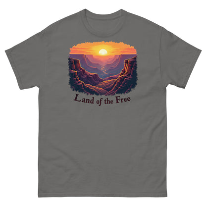 Charcoal gray t-shirt with a bold canyon sunrise design and “Land of the Free” slogan.