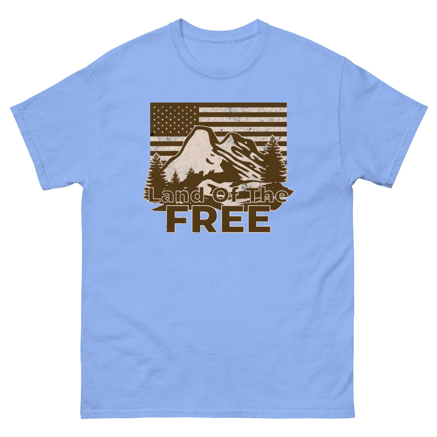 Carolina Blue t-shirt with mountain and forest design and bold “Land of the Free” text.
