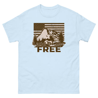 Light Blue t-shirt with rustic mountain scene and classic American outdoors design reading “Land of the Free.”