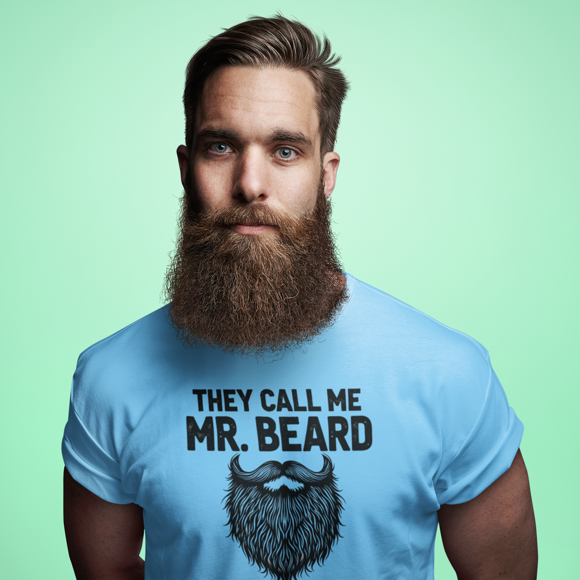 Bearded man wearing blue Mr. Beard shirt with confident stance and funny facial hair graphic