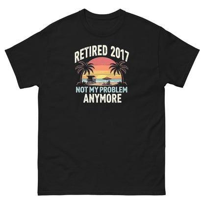 Black t-shirt with colorful sunset beach scene and “Retired 2017 Not My Problem Anymore” design