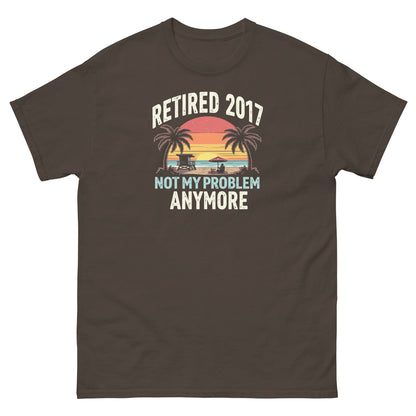 Dark chocolate brown t-shirt with vintage beach design and “Retired 2017 Not My Problem Anymore” slogan